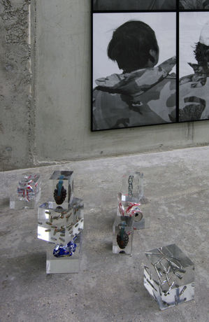 Cady Noland, 8 objects (bullets, handgranades, coke and beer cans), encased in plexicubes, 1986